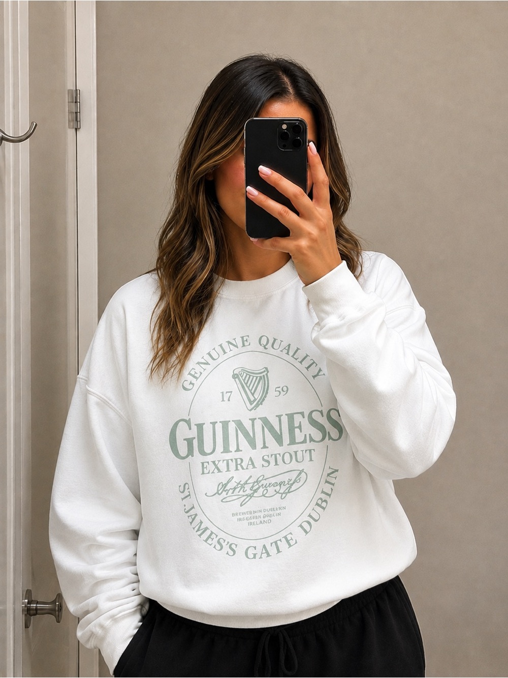 Faded White Guinness Crewneck Sweatshirt with Green Logo